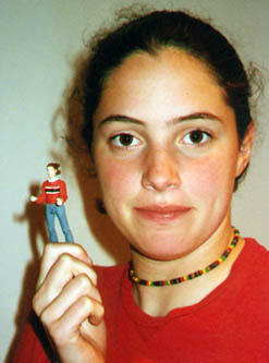 Carla holding her action figure